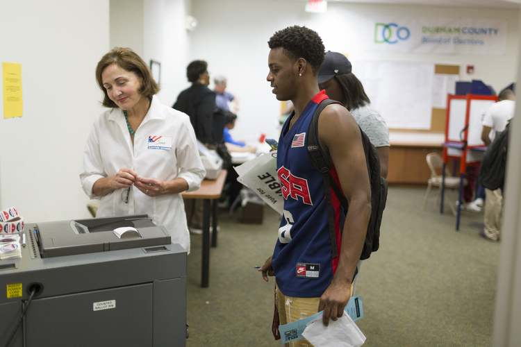 North Carolina Central University student Naje Gibson votes early at the Durham County Board of Elections. (D.L. Anderson/For The Post)</p>  