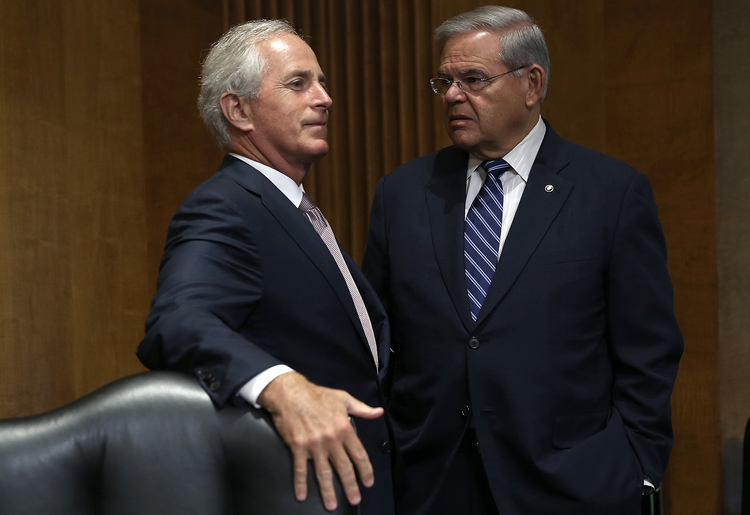Sen. Bob Corker (R-Tenn.), on the left,&nbsp;confers with Bob&nbsp;Menendez, on the right,&nbsp;before a hearing. (Win McNamee/Getty Images)</p>  