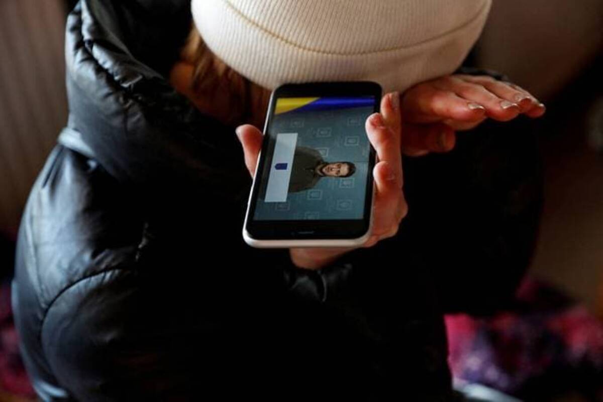 Ukrainian President Volodymyr Zelensky has harnessed online platforms to deliver his message. (Bernadett Szabo/Reuters)