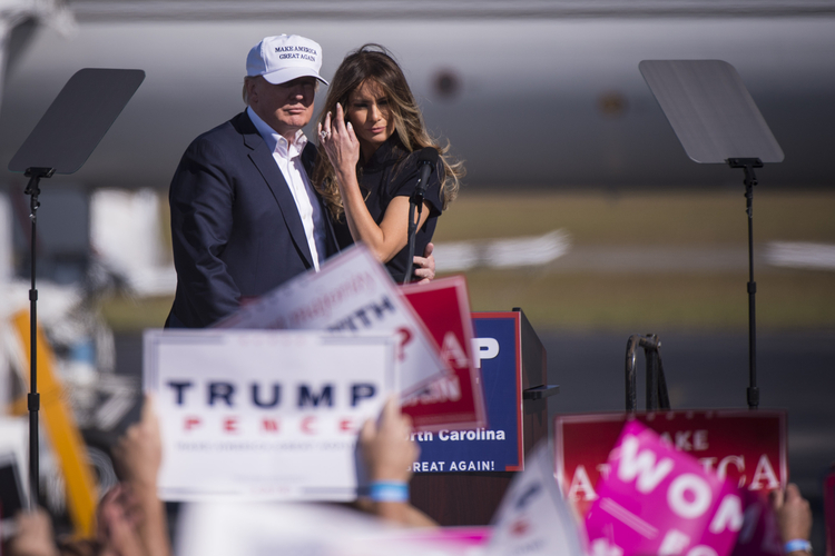 Trump and his wife Melania Trump speak during a campaign event in Wilmington.&nbsp;(Jabin Botsford/The Washington Post)</p>  