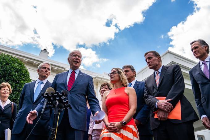 President Biden and senators speak after a meeting regarding infrastructure negations at the White House on Thursday. (Demetrius Freeman/The Washington Post)