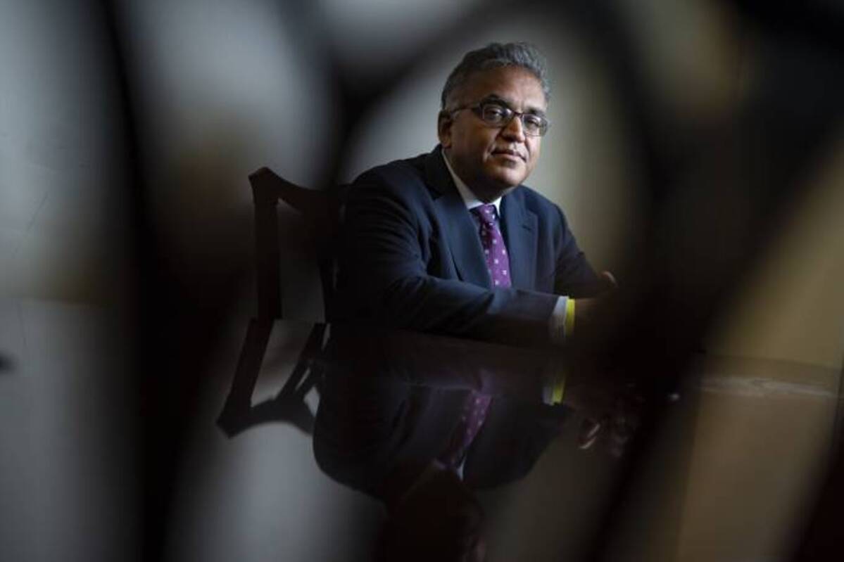 Coronavirus response coordinator Ashish Jha poses in his office at the White House on Friday. (Jabin Botsford/The Washington Post)
