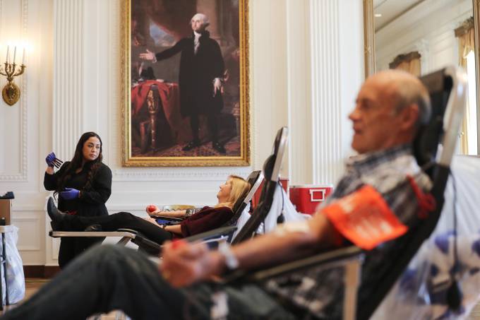 People donate blood during a blood drive at the Richard Nixon Presidential Library in 2020. (Mario Tama/Getty Images)