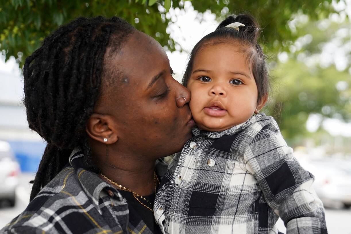 Reese Brooks and her daughter Auzura Brooks enjoy eating ice cream in Delaware.