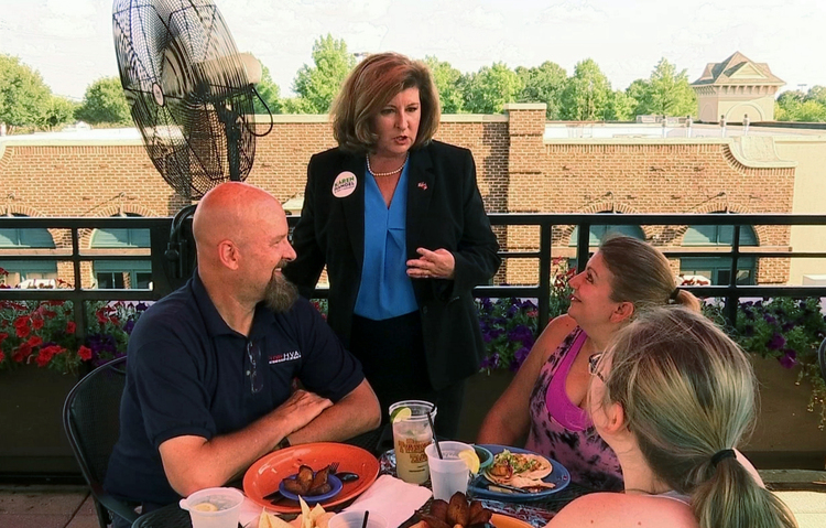 Karen Handel campaigns in Johns Creek, Ga., ahead of Tuesday's runoff election to replace former Tom Price. Democrat Jon Ossoff is trying for an upset over Handel in the GOP-leaning Sixth Congressional District that stretches across greater Atlanta's northern suburbs. (Alex Sanz/AP)</p>  