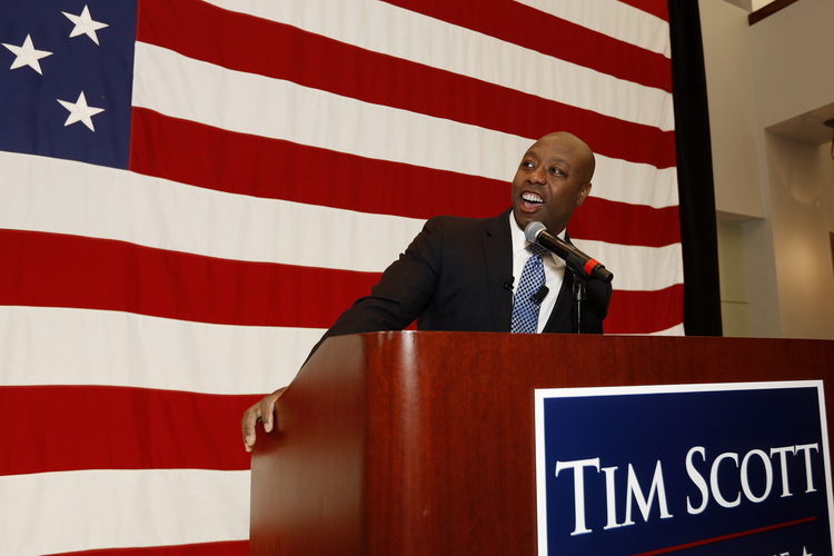 Tim Scott celebrates winning a full term in the Senate last week. (Mic Smith/AP)</p>  