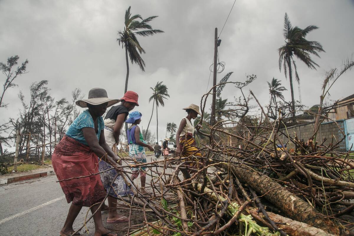 People in Madagascar clear debris after Cyclone Batsirai last month. (Rijasolo/AFP/Getty Images)