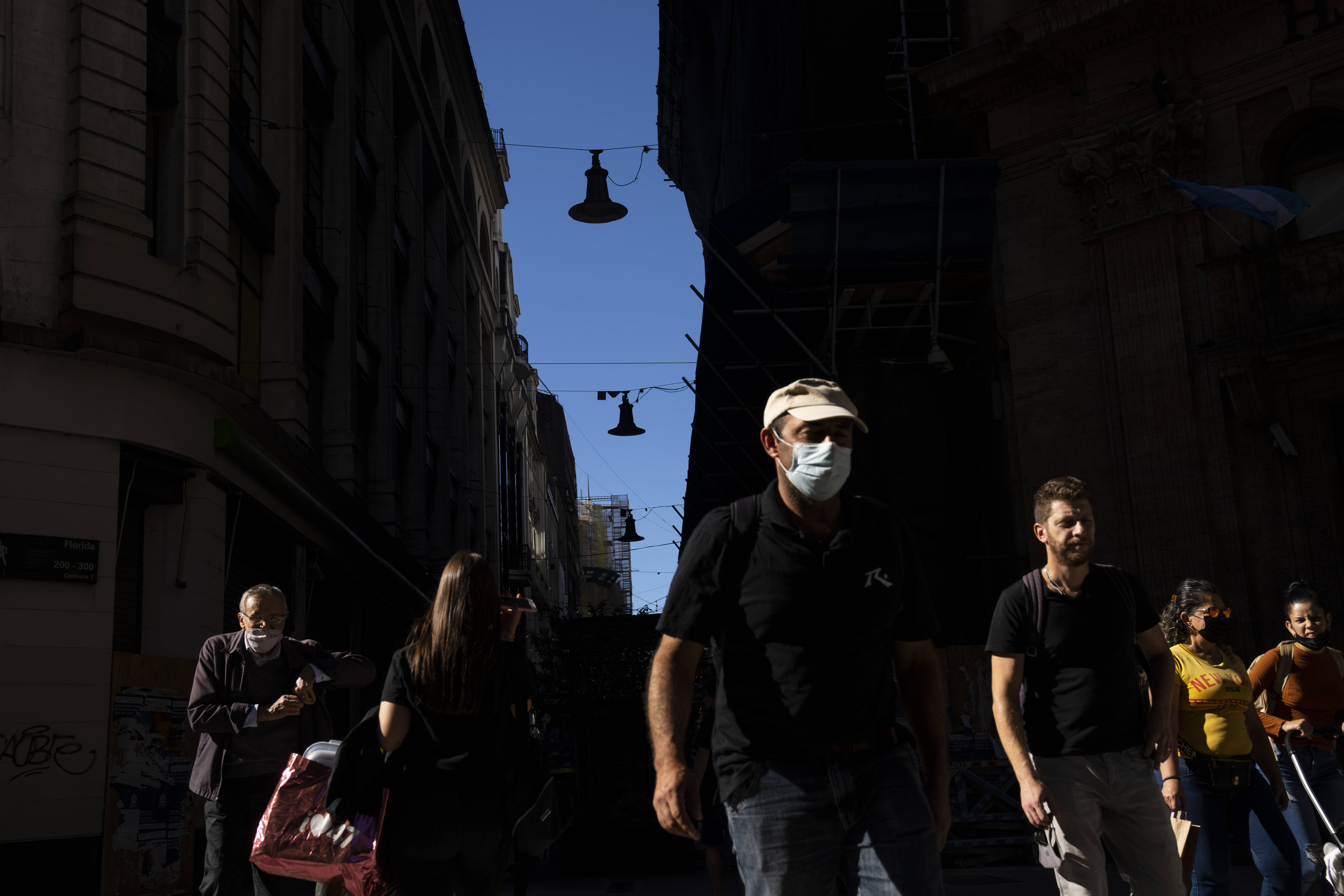 Pedestrians in downtown Buenos Aires last week. (Rodrigo Abd/AP)