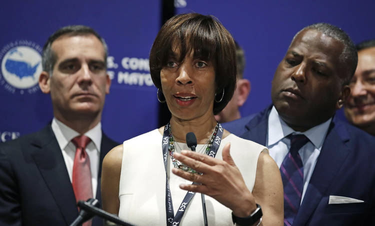 Embattled Baltimore Mayor Catherine Pugh addresses a gathering during the annual meeting of the U.S. Conference of Mayors in Boston. (Charles Krupa/AP)  