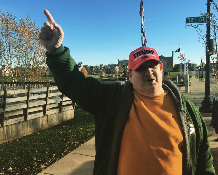 Larry Ancona points out the rows of homes where there used to be an American Motors plant in Kenosha, Wis. (David Weigel/The Washington Post)</p>  