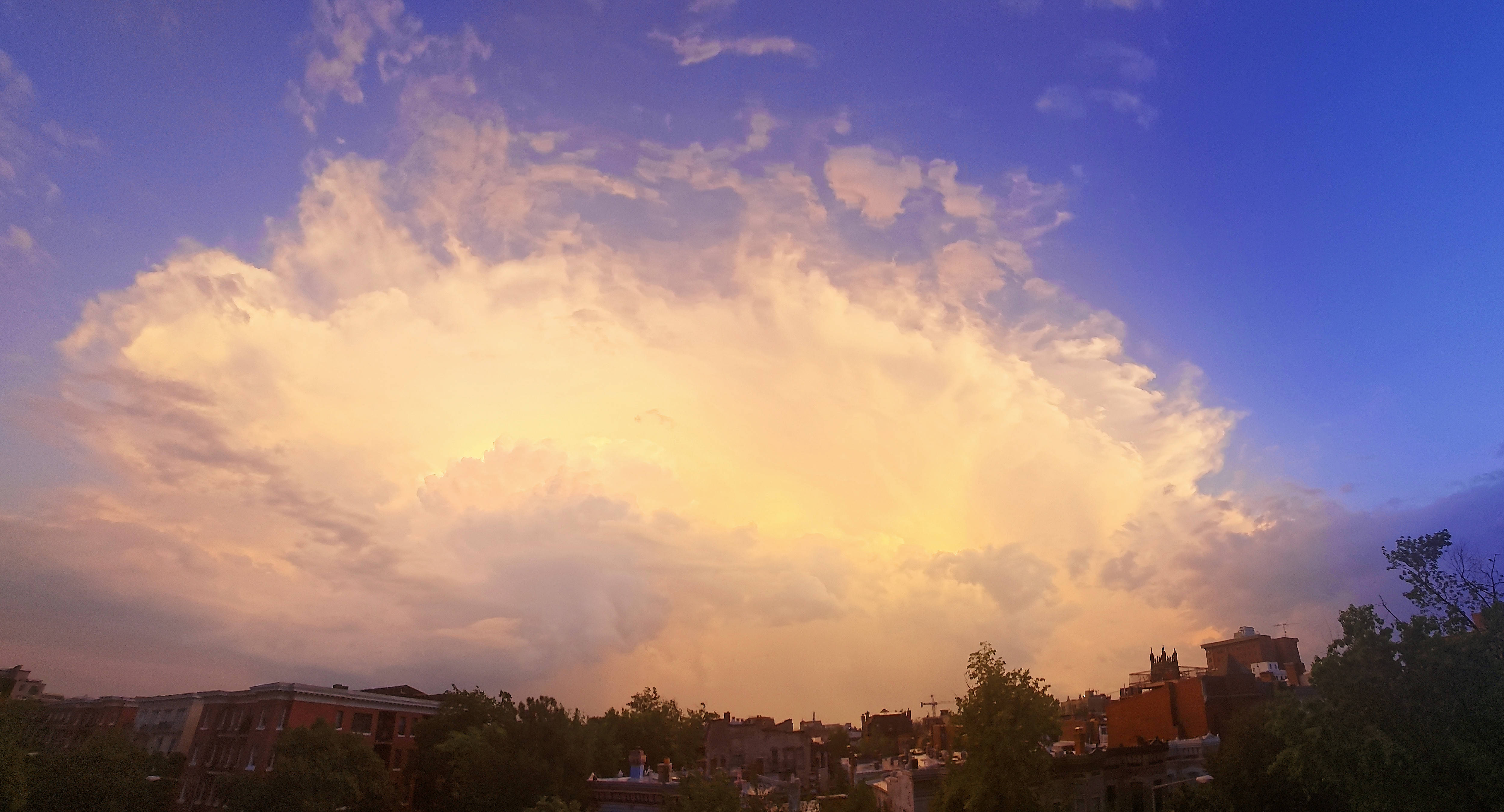The setting sun lights up storm clouds that blew through D.C. on Monday evening.