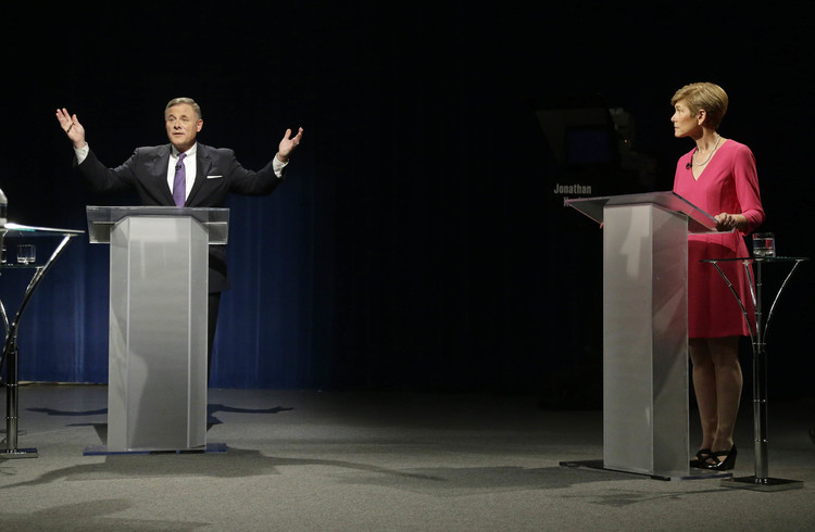 Richard Burr and Deborah Ross square off in the Research Triangle at their final debate.&nbsp;(Gerry Broome/AP/Pool)</p>  
