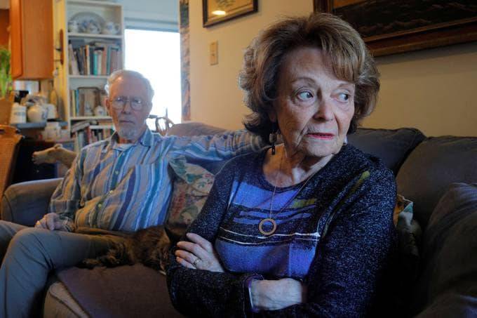 Cynthia Flagg sits with her husband Charles, who took part in an early-stage trial of Aduhelm following his diagnosis with Alzheimer's disease, at their home in Jamestown, R.I. (Brian Snyder/Reuters)