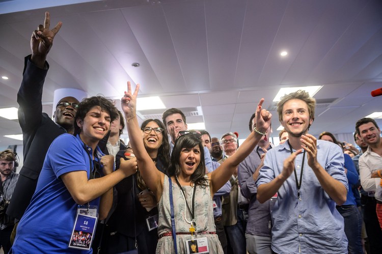 Supporters of "Le Republique En Marche," the party created by French President Emmanuel Macron, react yesterday as results started to come in. (Chrisophe Petit Tesson/EPA)</p>  