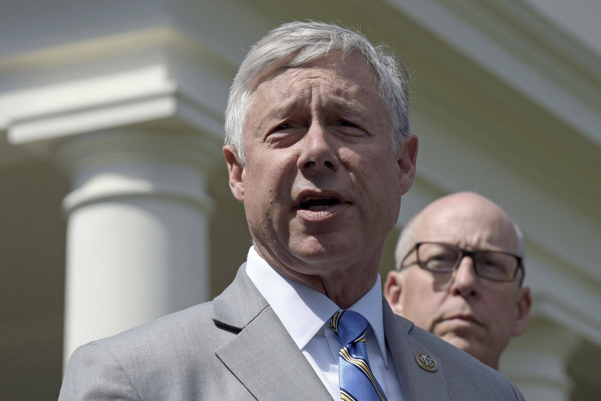 Rep. Fred Upton (R-Mich.), who announced his pending retirement on Tuesday, speaks to reporters outside the White House in 2017. (Susan Walsh/AP)