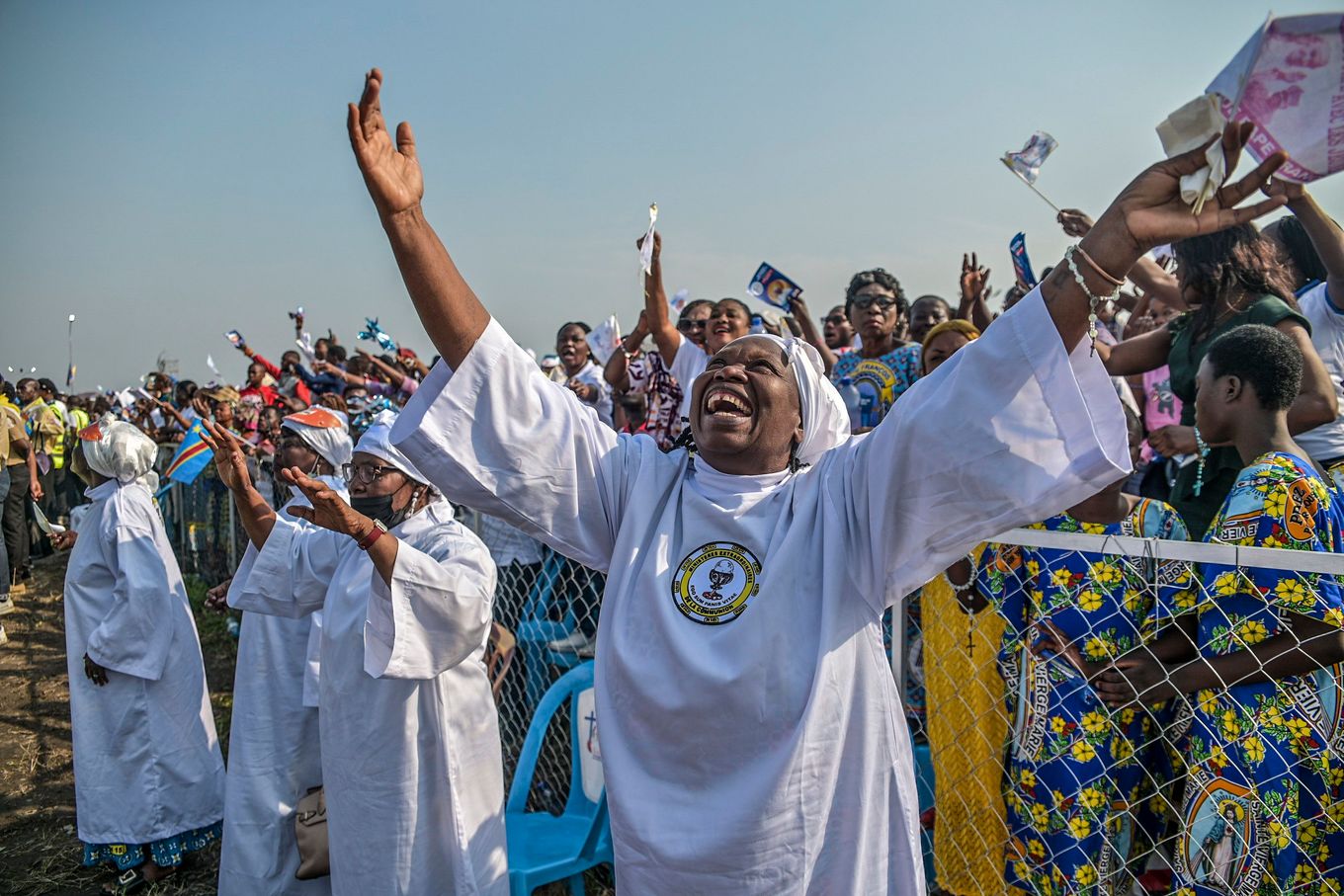 Worshipers welcome Pope Francis at the Mass in Kinshasa, the capital, on Wednesday. (Moses Sawasawa/AP)