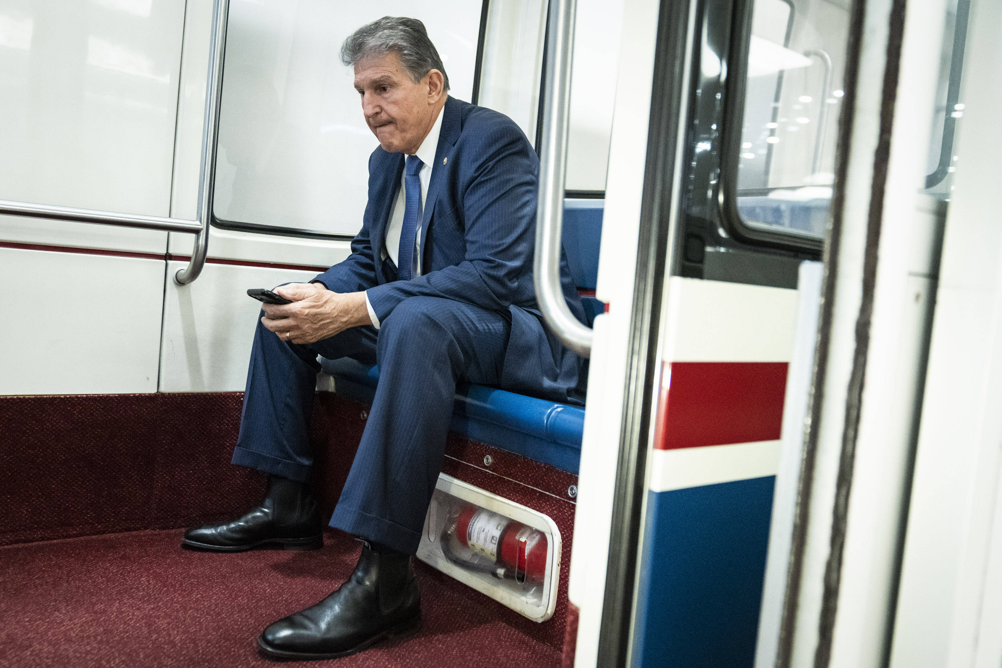 Sen. Joe Manchin III (D-W.Va.) on the subway in the Senate. (Jabin Botsford/The Washington Post)