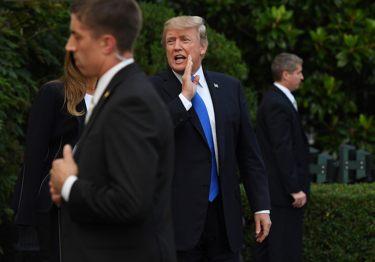 Donald Trump leaves the White House to board Marine One for a trip in France. (Matt McClain/The Washington Post)  