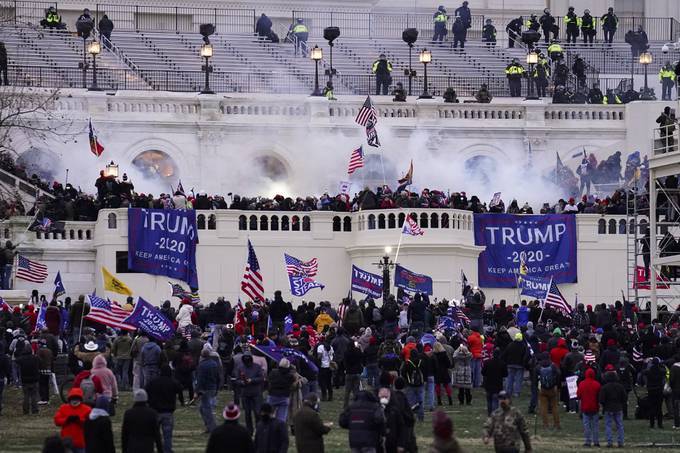 Three agencies said they used facial recognition technology to identify participants in the Jan. 6 Capitol riot. (John Minchillo/AP)