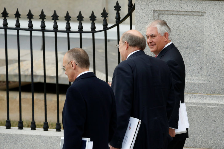 Trump appointees Andy Puzder, Joe Hagin and Rex Tillerson depart transition meetings at the Eisenhower Executive Office Building. (Jonathan Ernst/Reuters)</p>  