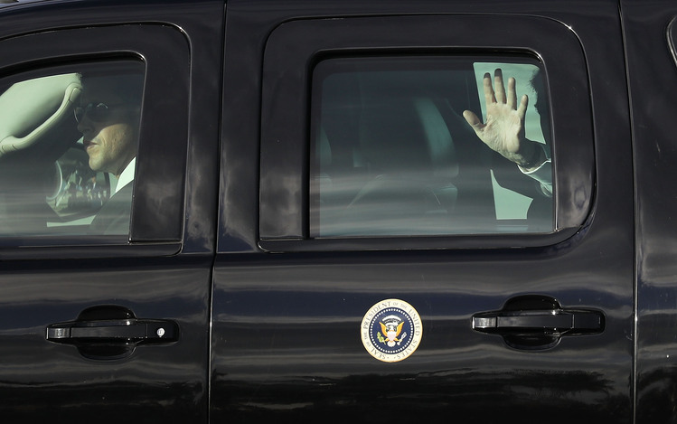 Donald Trump is driven away after arriving on Air Force One at the Palm Beach International Airport last Thursday. (Joe Raedle/Getty Images)</p>  