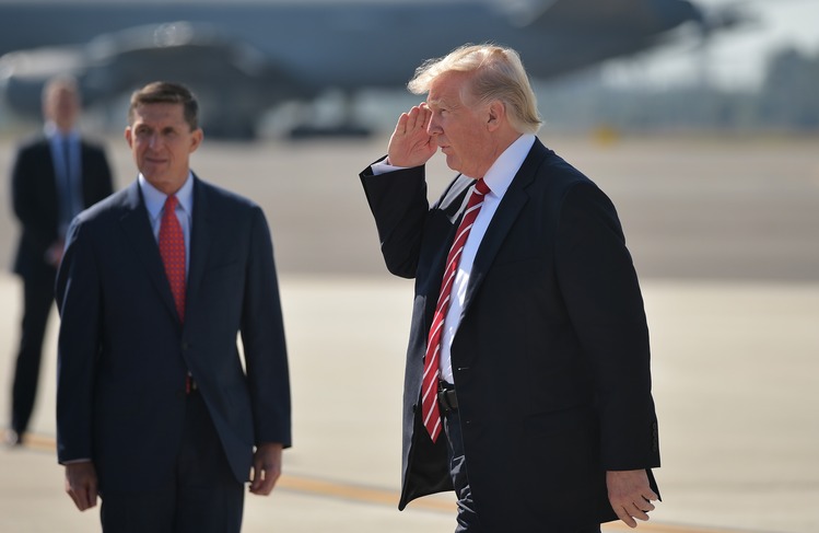 Michael Flynn and Donald Trump arrive at MacDill Air Force Base in Tampa last week to visit the US Central Command headquarters. (Mandel Ngan/AFP/Getty Images)</p>  