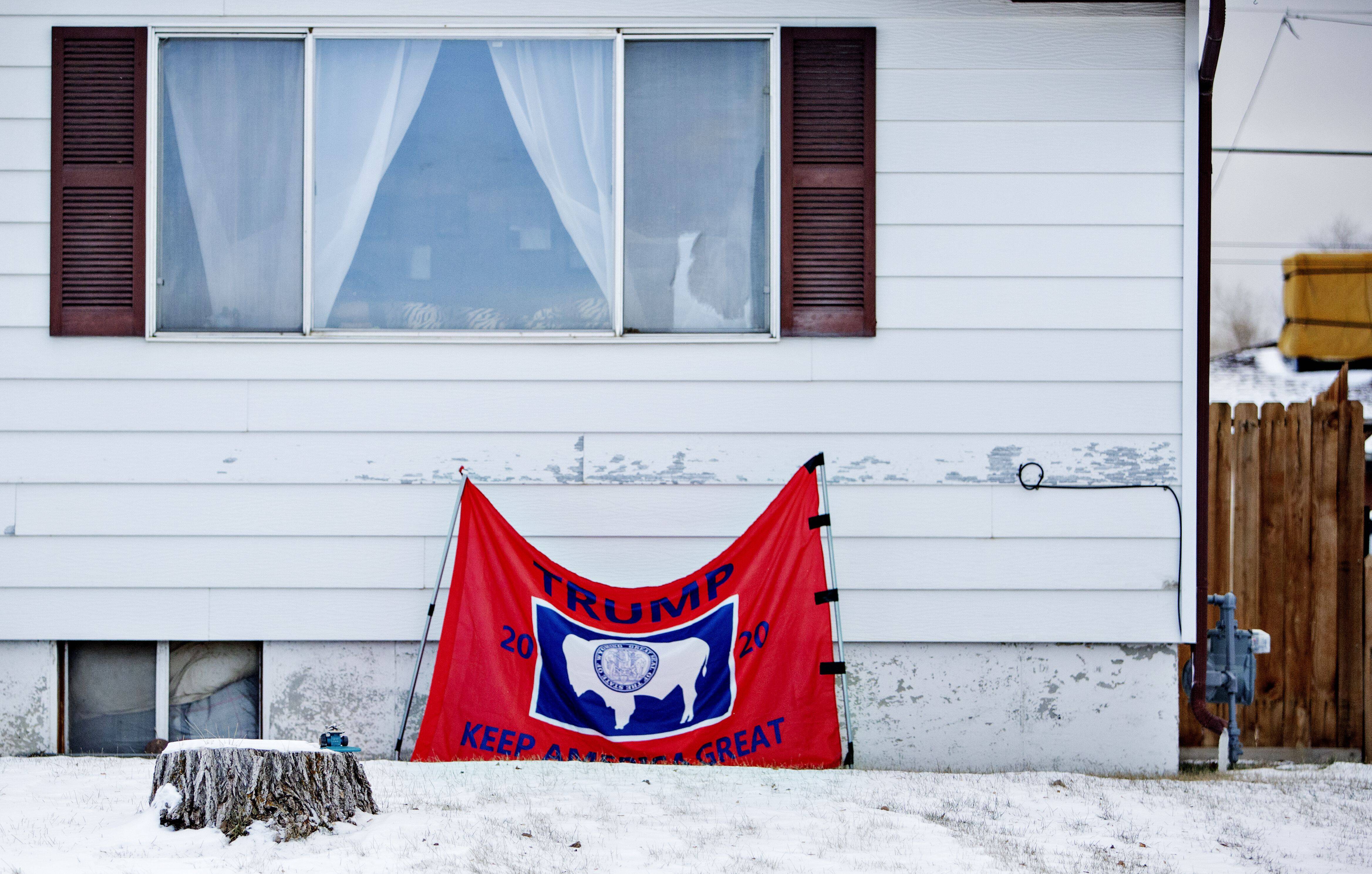 A Trump-themed Wyoming flag outside a home in Rock Springs, Wyo., on Dec. 16, 2020. (Photo by Kim Raff for The Washington Post)