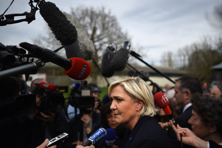 Marine Le Pen&nbsp;arrives at a pig farm for a campaign event in Pordic, France. (Michael Robinson Chavez/The Washington Post)</p>  