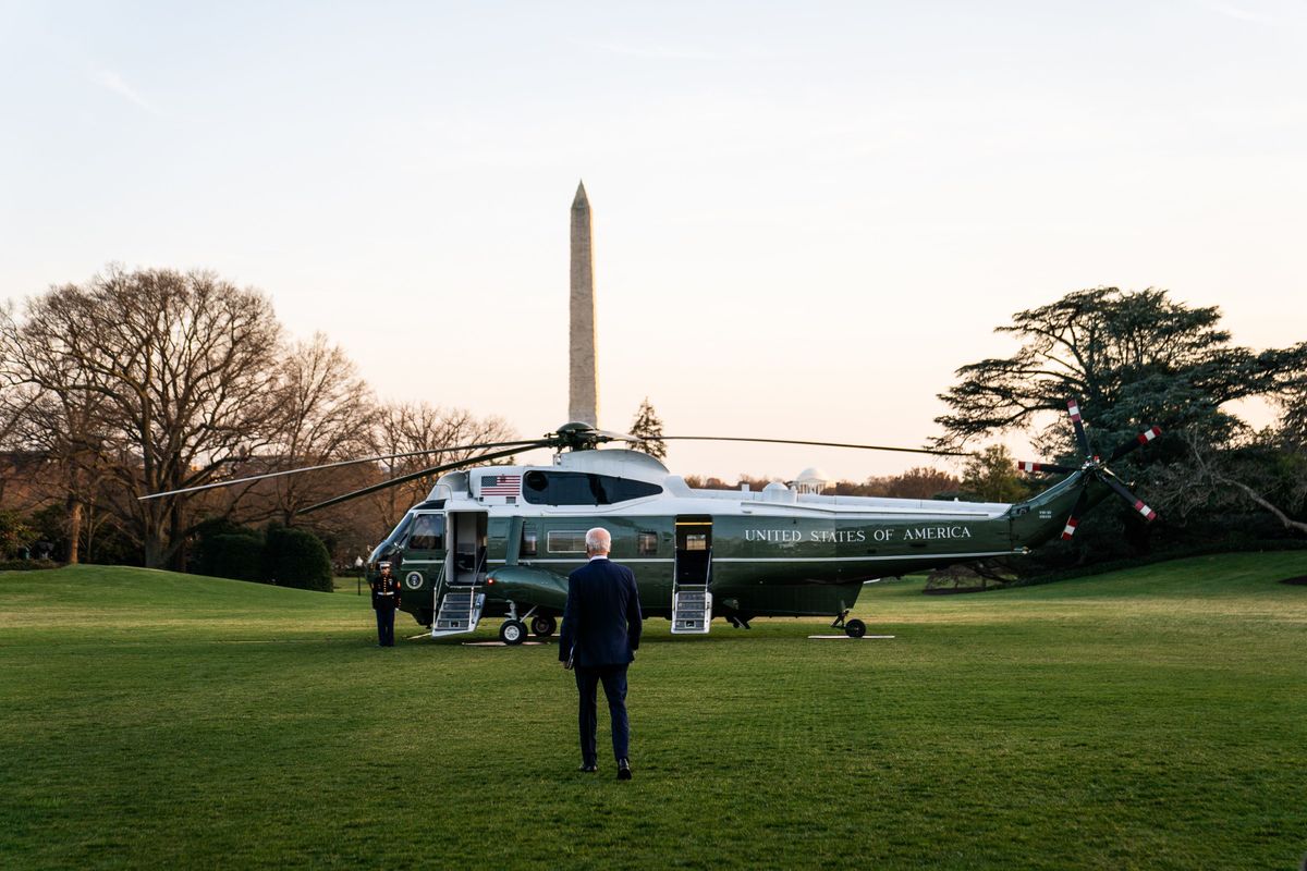 President Biden makes his way to Marine One on the South Lawn of the White House on Wednesday. (Demetrius Freeman/The Washington Post)