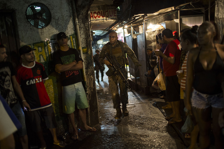 A police officer patrols in Rio de Janeiro.&nbsp;(AP Photo/Felipe Dana)</p>  