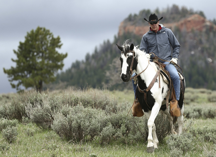 Interior Secretary Ryan Zinke enjoys a horseback ride in the Bears Ears National Monument of Utah last week. (Scott G Winterton/The Deseret News via AP)</p>  