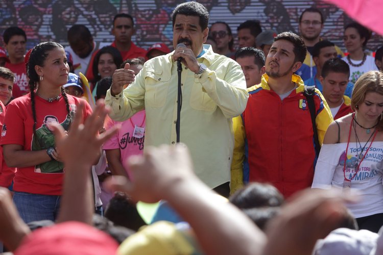 Venezuelan President Nicolas Maduro gives a speech about Bernie in Caracas, yesterday. (EPA/Cristian Hern&aacute;ndez)</p>  