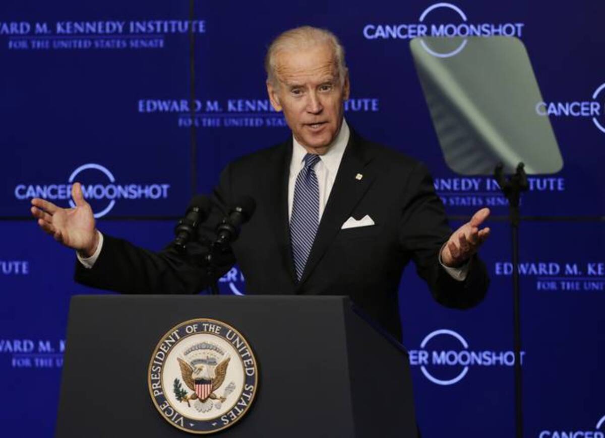 President Biden speaks in 2016 about his cancer moonshot initiative. (Elise Amendola/AP)