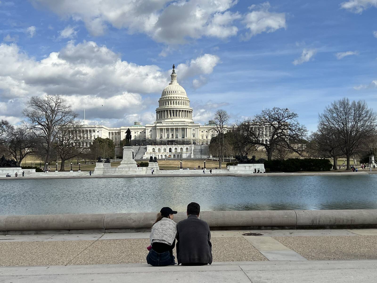 A mix of sun and clouds over the Capitol. (Jeannie in D.C./Flickr)