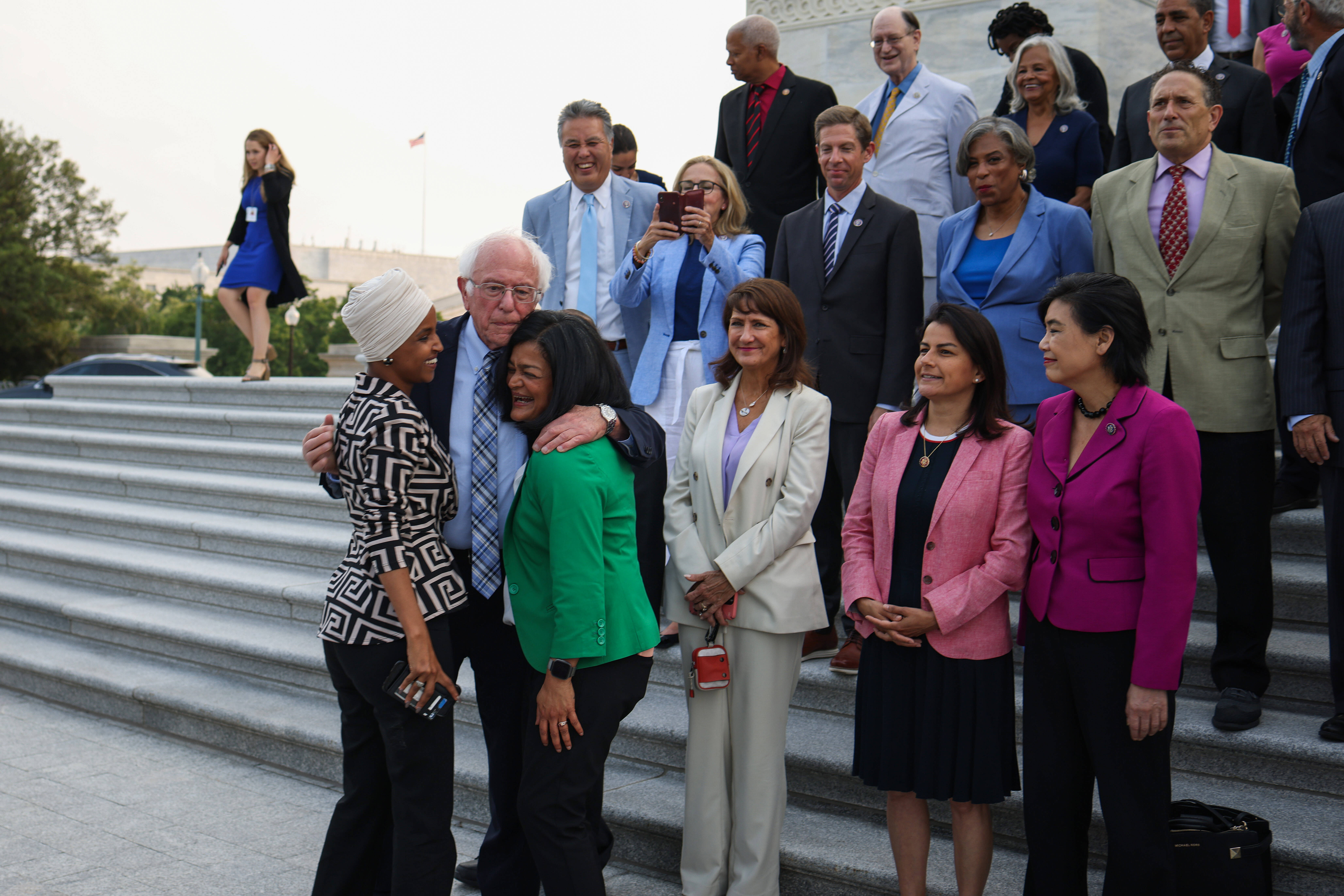 Sen. Bernie Sanders (I-Vt.) greets Reps. Ilhan Omar (D-Minn.) and Pramila Jayapal (D-Wash.) (Anna Moneymaker/Getty Images)