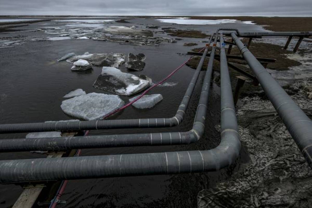 Pipelines extend across the landscape outside Nuiqsut, Alaska. (Bonnie Jo Mount/The Washington Post)