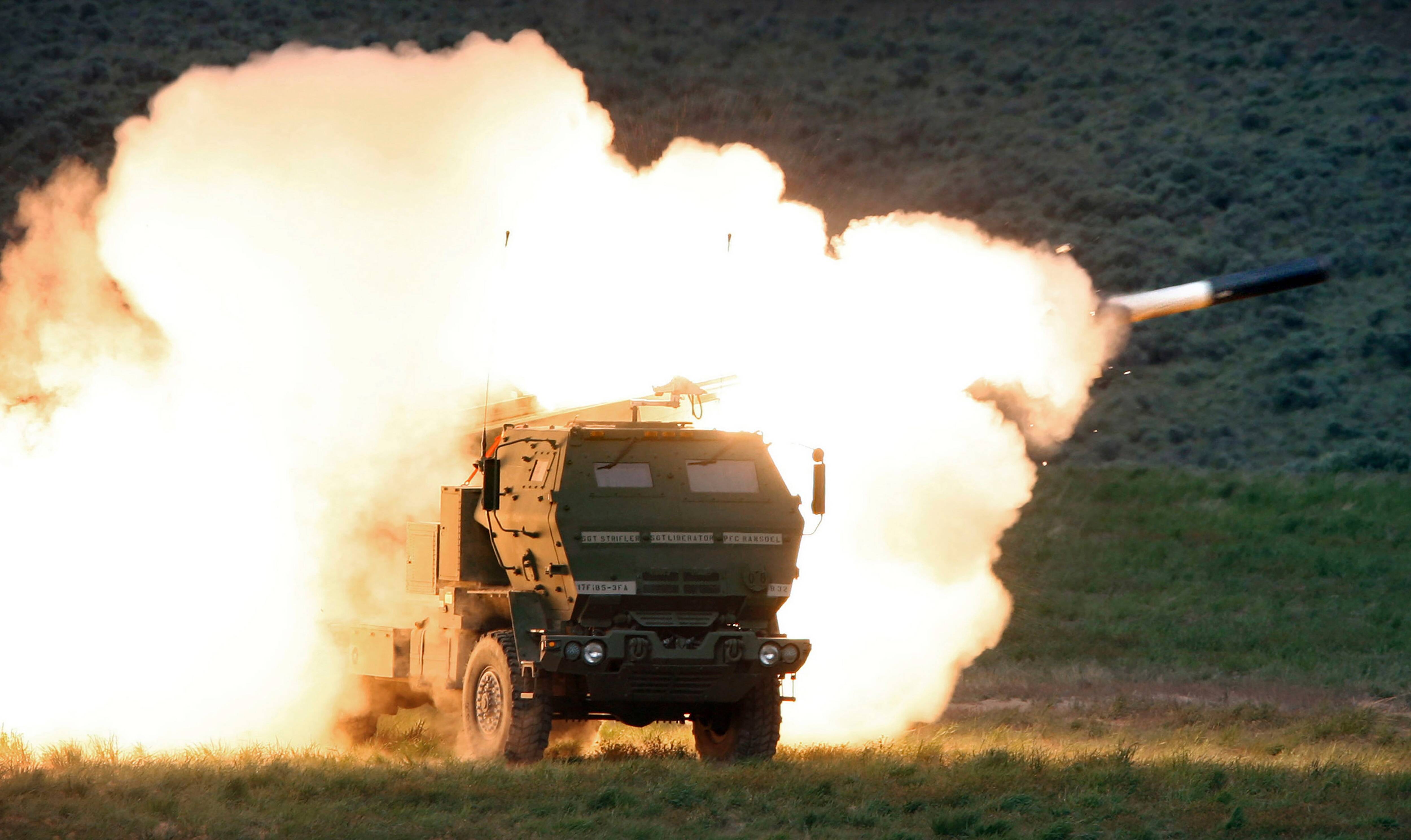 A High Mobility Artillery Rocket System is launched during combat training at the Yakima Training Center in Washington in 2011. (Tony Overman/Olympian/AP)