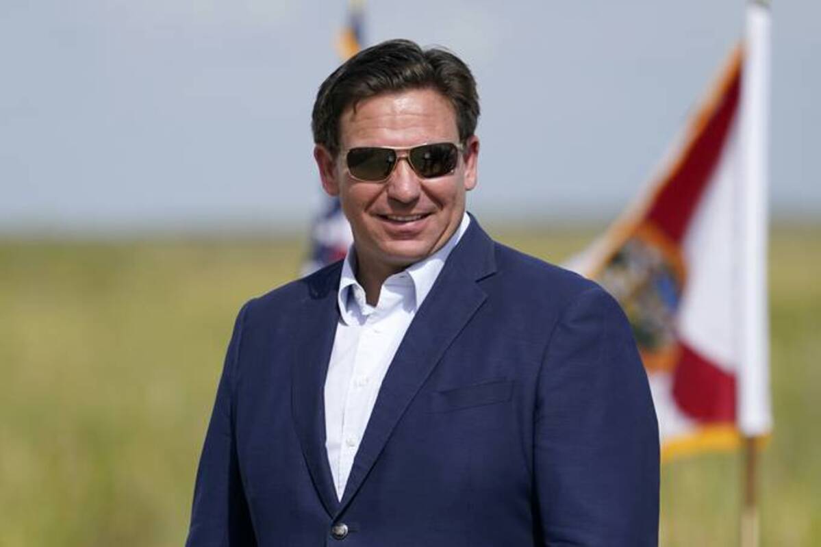 Florida Gov. Ron DeSantis (R) attends a media event regarding the 2022 Florida Python Challenge on June 16 in Miami. (Lynne Sladky/AP)