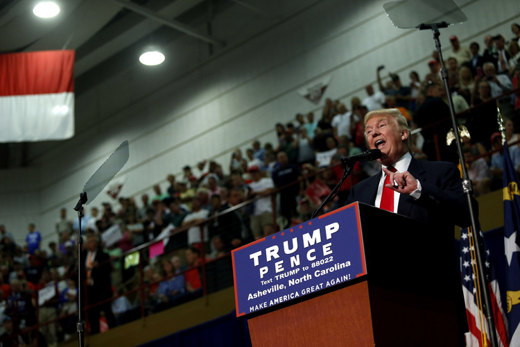Trump speaks last night&nbsp;at U.S. Cellular Center in Asheville, North Carolina.&nbsp;(Brian Blanco/Getty Images)</p>  