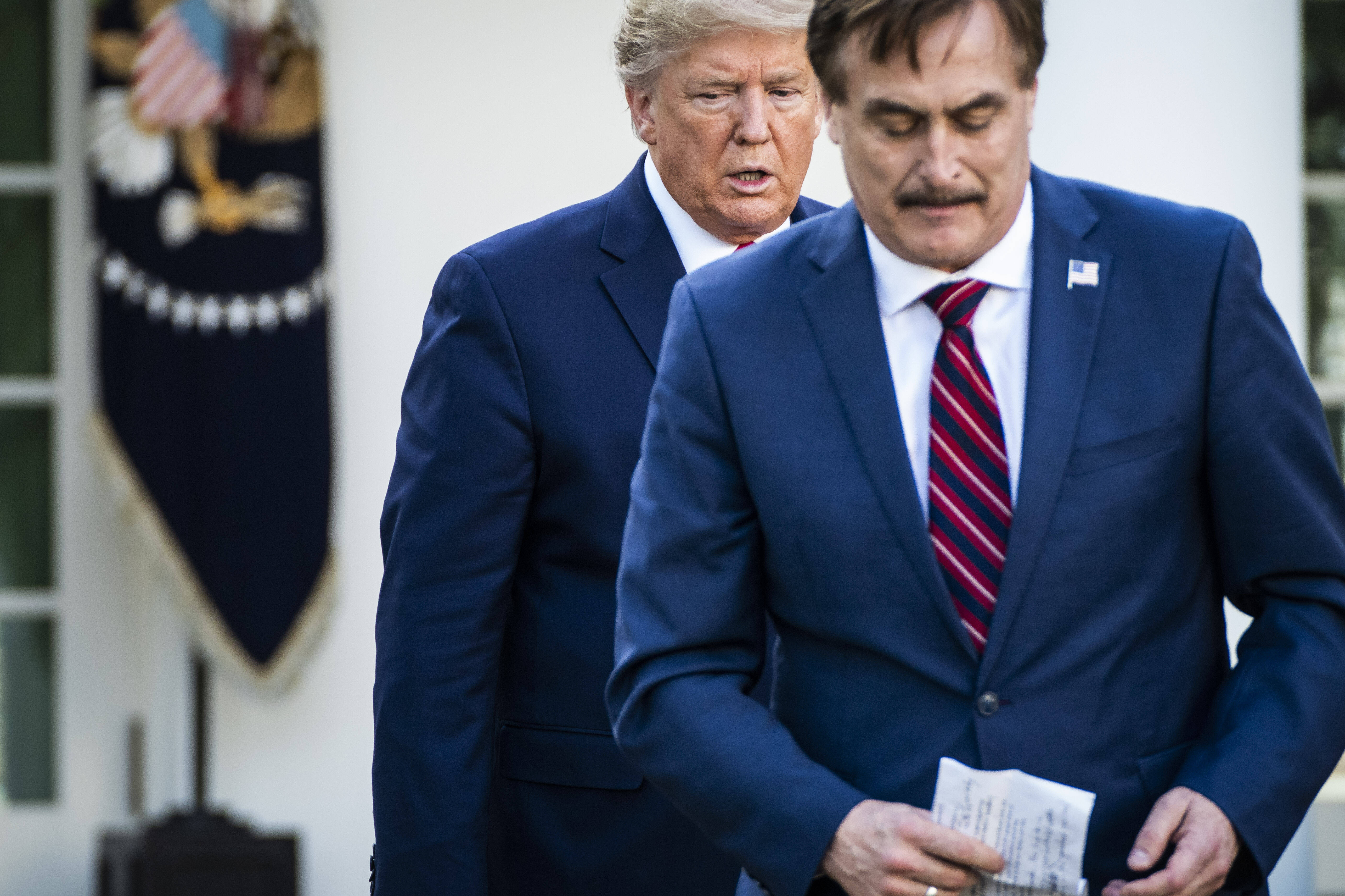 Trump with MyPillow CEO Mike Lindell in March 2020. (Jabin Botsford/The Washington Post)