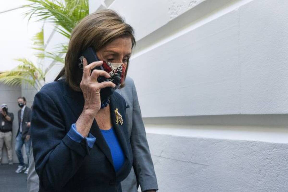 House Speaker Nancy Pelosi arrives for a meeting with House Democrats this morning. (Jacquelyn Martin/AP)