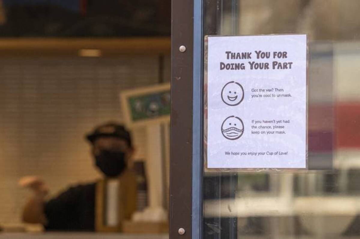As pandemic restrictions like indoor mask mandates begin to fall, it will be up to individual businesses, school districts and local governments to decide whether to require people to take extra precautions for the coronavirus. (David Paul Morris/Bloomberg News)