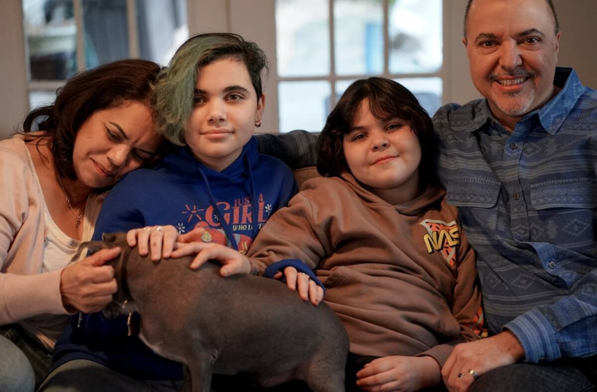 From left, Camille, Alexandra, Leon and Homero Rey at their home in Potomac, Md. Leon, 9, is transgender. He and his family moved from Texas to protect his rights. (Bonnie Jo Mount/The Washington Post)
