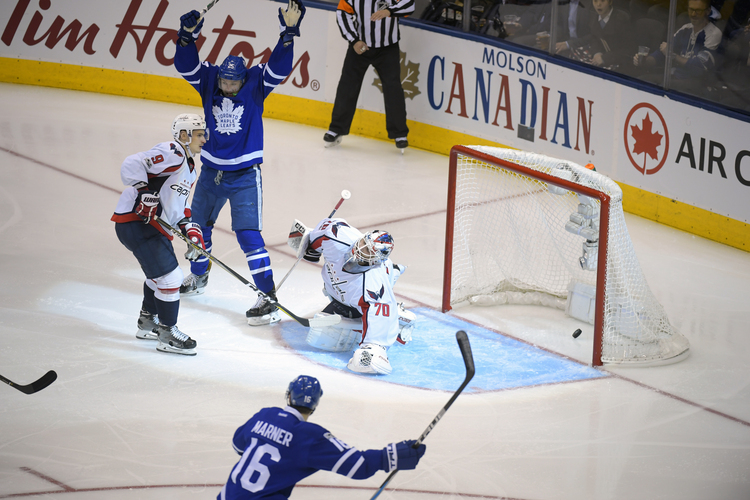 Washington goalie Braden Holtby (70) is devastated after Toronto wins 4-3 in overtime last night. (John McDonnell/The Washington Post)</p>  