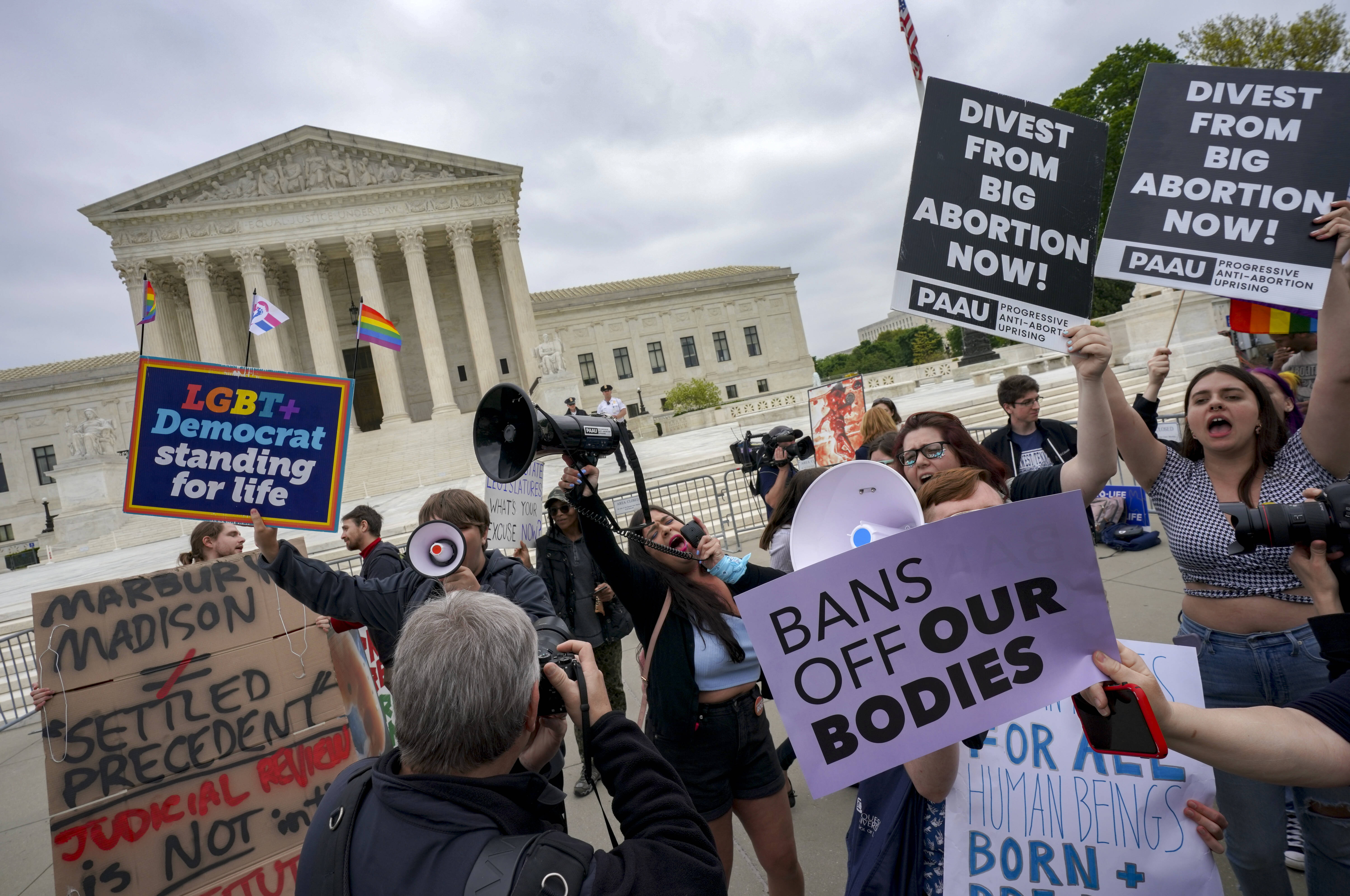 Demonstrators outside the Supreme Court on Tuesday. (Bonnie Jo Mount/The Washington Post)
