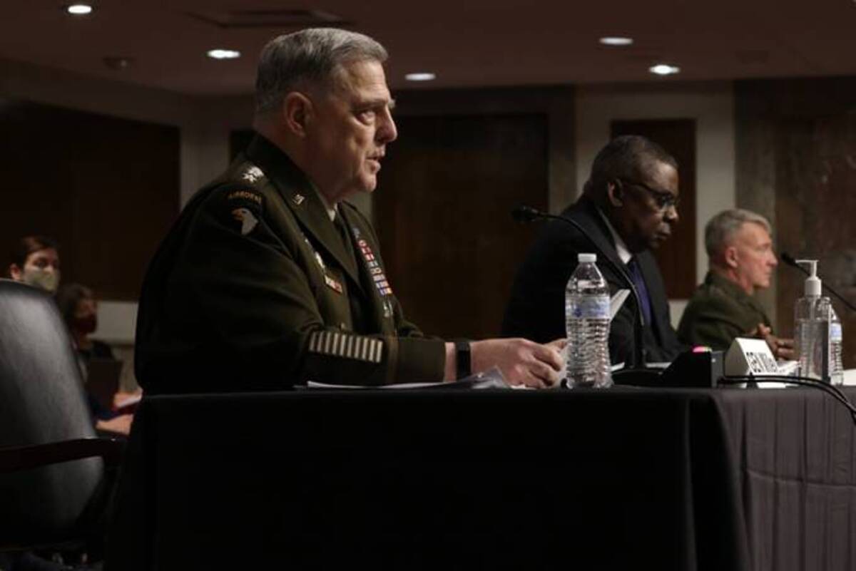 Defense Secretary Lloyd Austin, chairman of the Joint Chiefs of Staff Gen. Mark A. Milley and Commander of U.S. Central Command Gen. Kenneth McKenzie, right, testified during a hearing before Senate Armed Services Committee this morning. (Alex Wong/Getty Images)