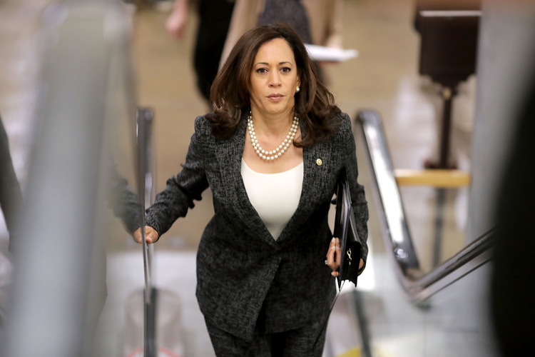 Sen. Kamala Harris (D-Calif.) heads from her Capitol office to a lunch with other senators. (Chip Somodevilla/Getty Images)</p>  
