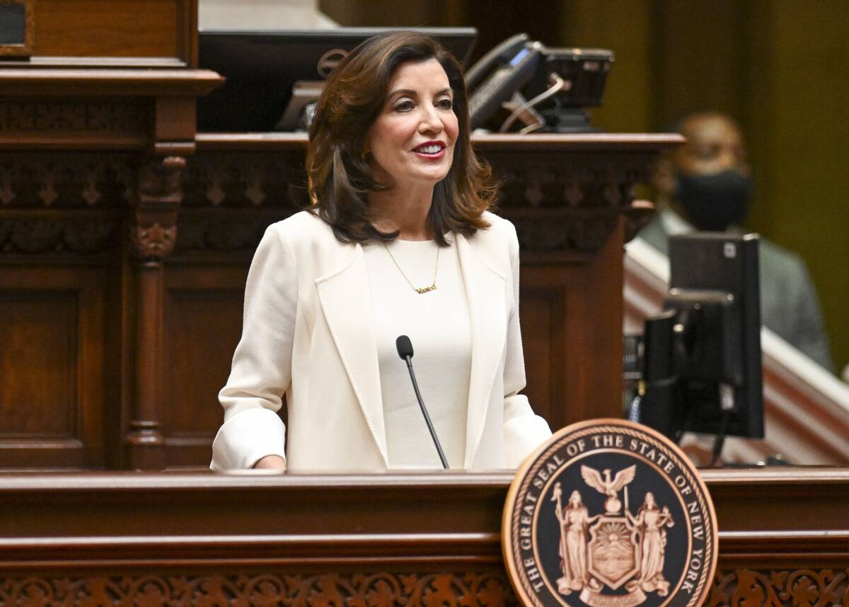 New York Gov. Kathy Hochul (D) delivers her first State of the State address on Jan. 5 at the Capitol in Albany. (Hans Pennink/Pool/Reuters)