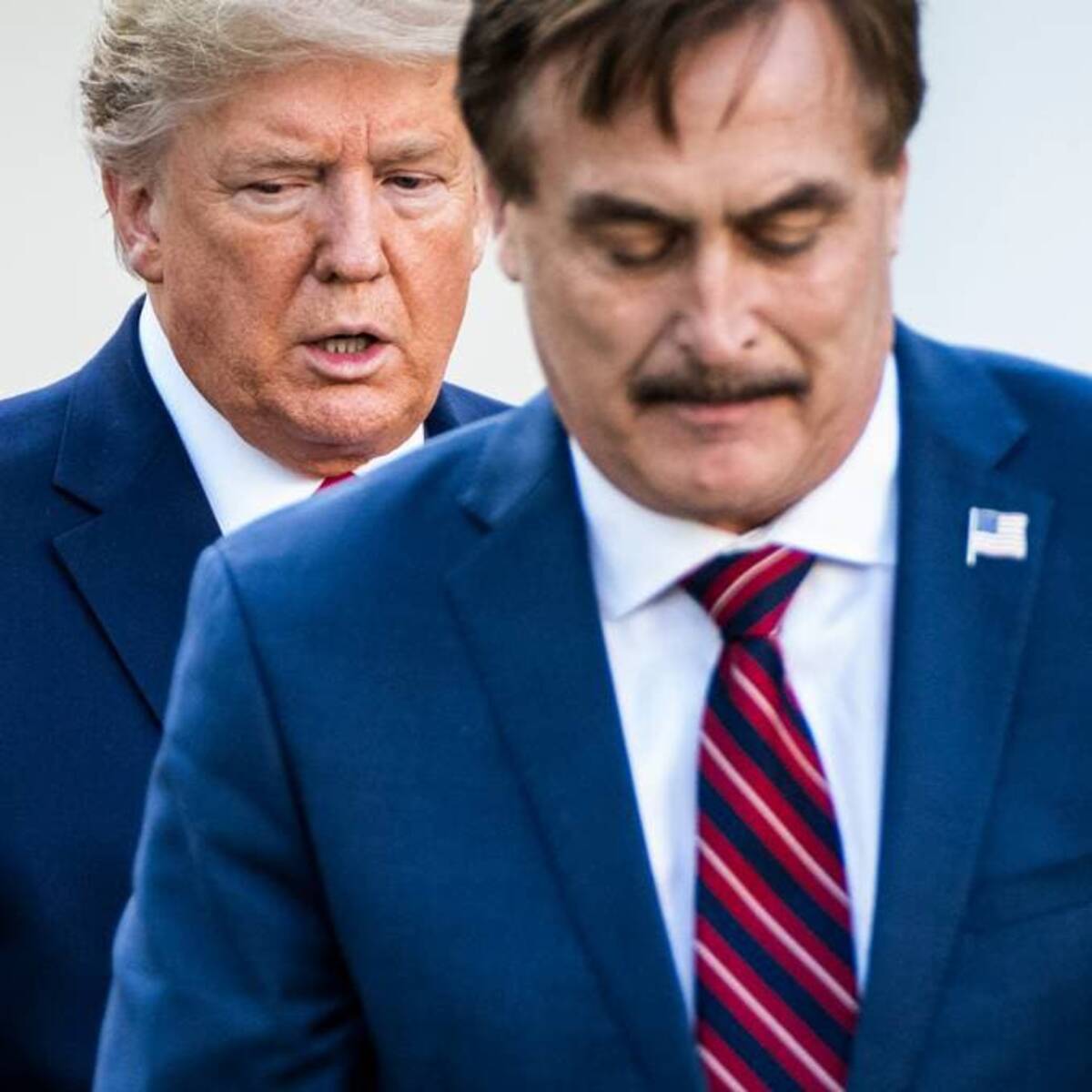 Former president Donald Trump with My Pillow CEO Mike Lindell. (Jabin Botsford/The Washington Post)