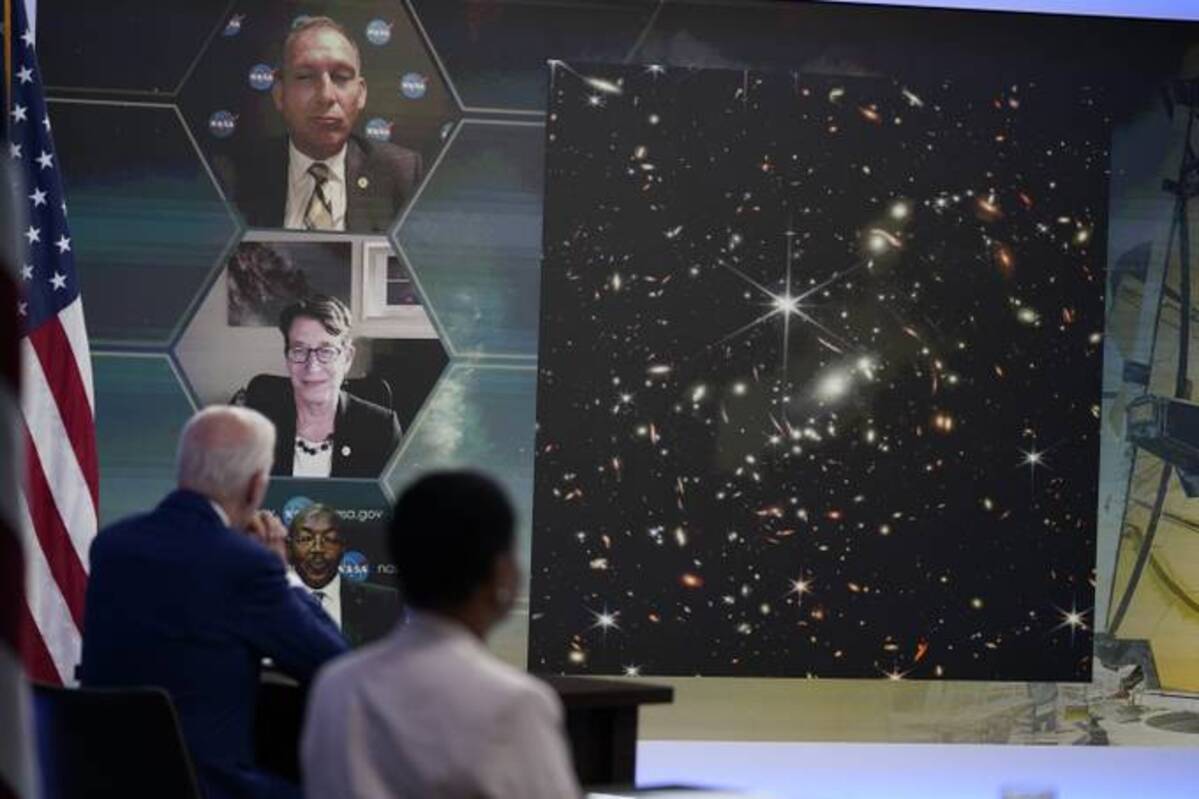 Biden receives a briefing from NASA officials about the first images from the James Webb Space Telescope on July 11. (Evan Vucci/AP)